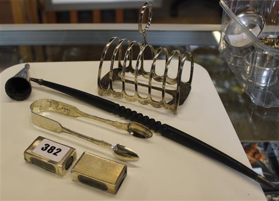 Small silver- a toast rack, tongs, 2 match box holders and an extinguisher